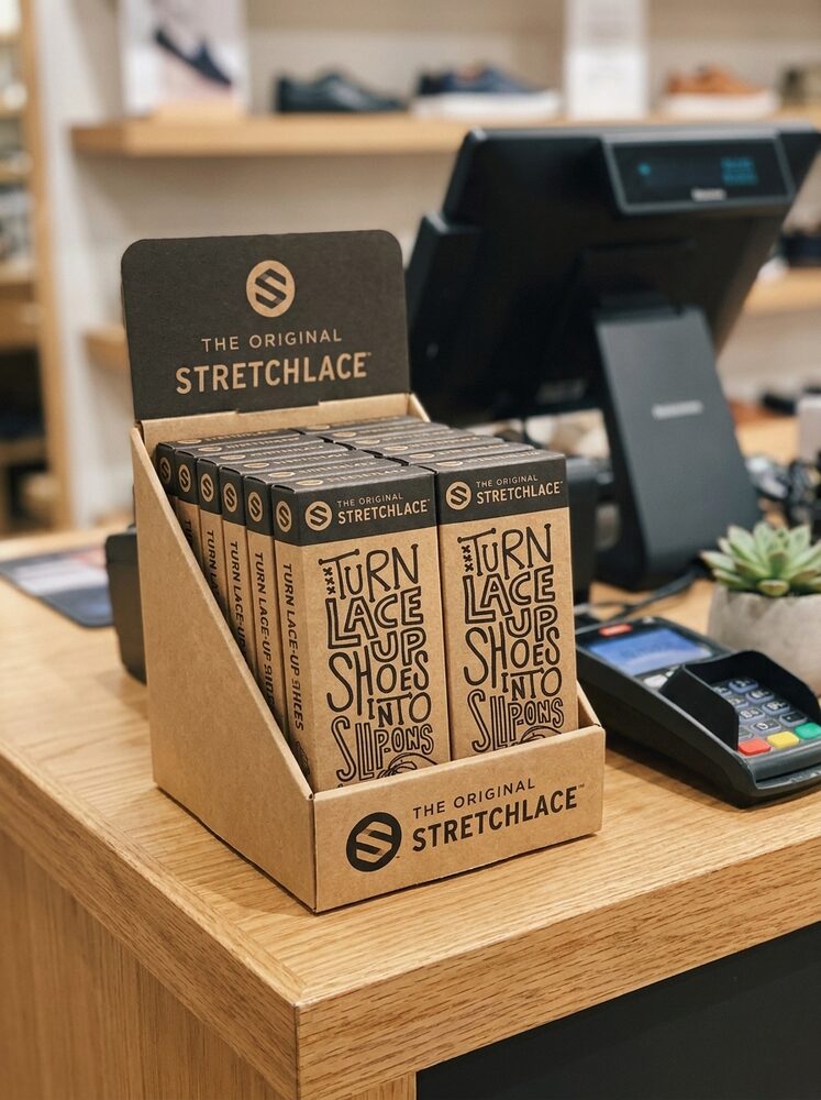 The Original Stretchlace counter display on a store countertop